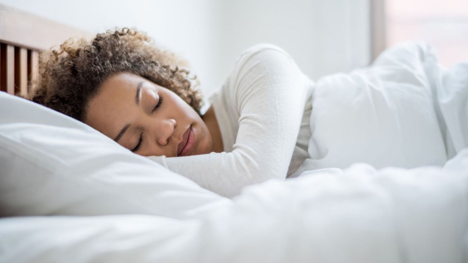 A woman having a comfortable sleep on anti allergy duvets